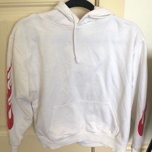 White hoodie with flames on sleeves